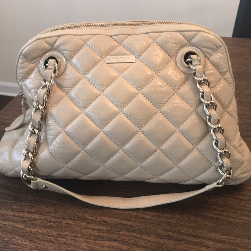 Quilted cream Kate spade bag with dust cover